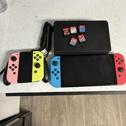 Nintendo Switch Oled Comes With extra Joycon and Games! Supersmash Bros, MarioKart, etc