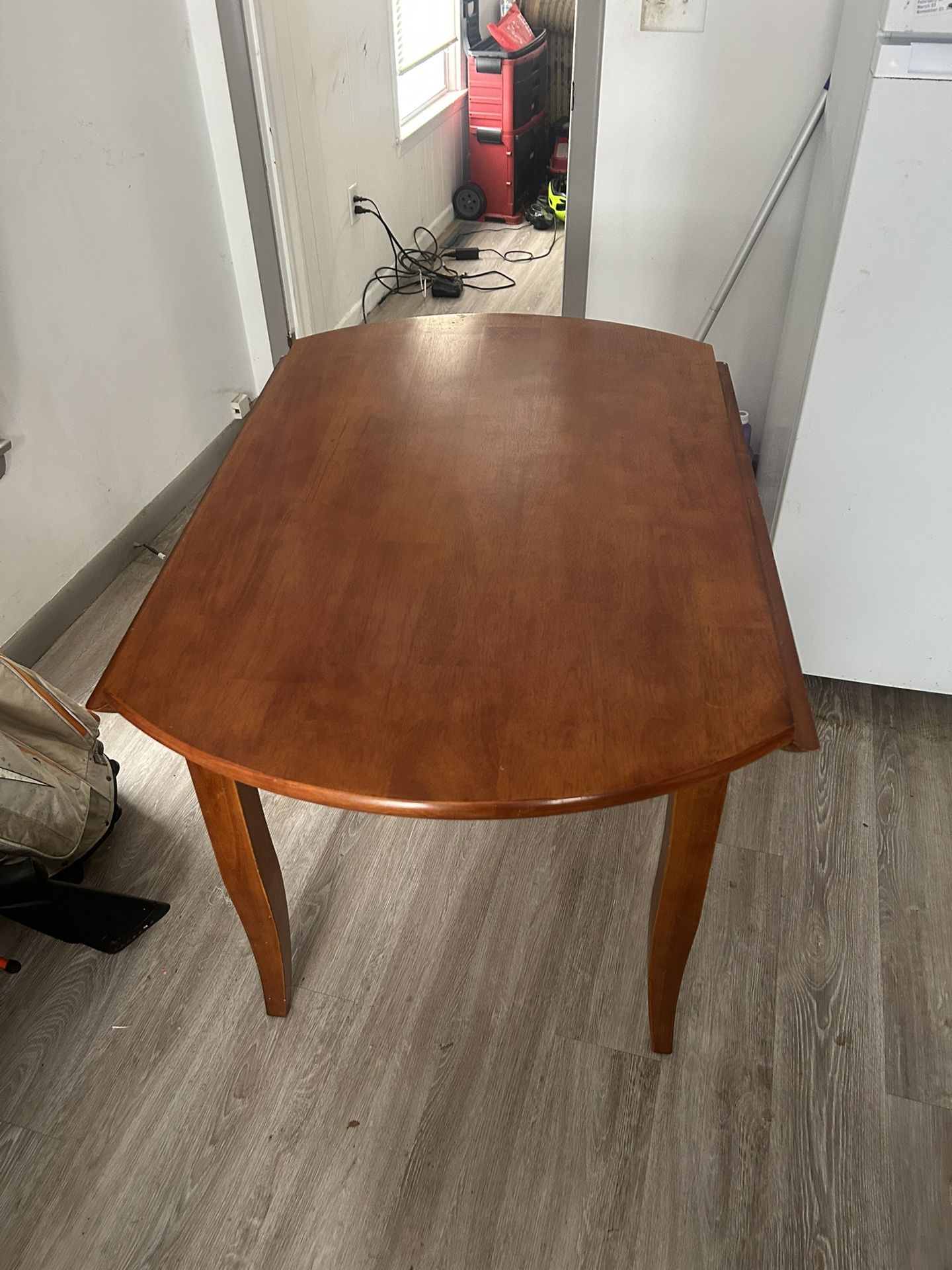 Wooden Table With Foldable Wings