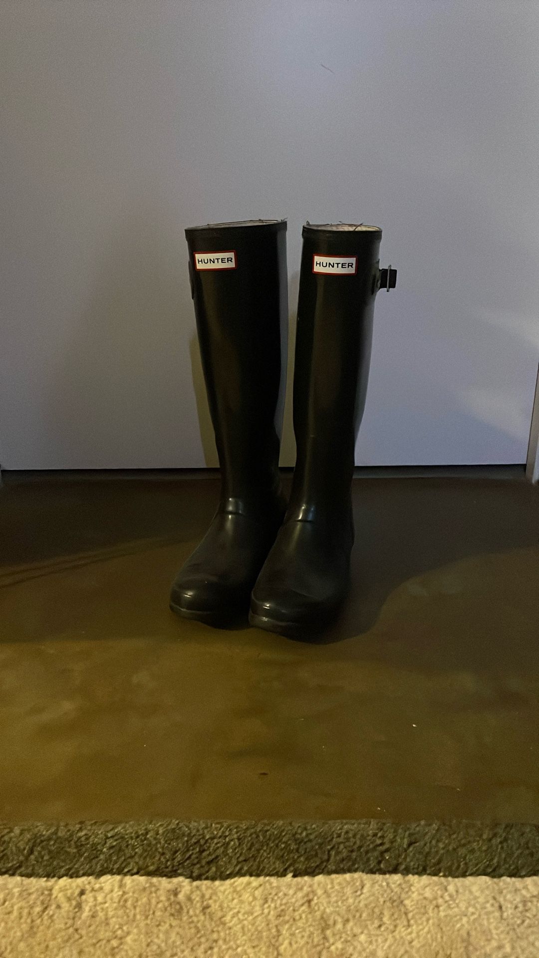 Tall black Hunter boots, Size 7