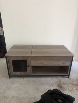 Center table with lifting top
