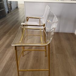 2 Clear/Gold Barstool Chairs 