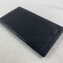 Authentic CHANEL Quilted Black Lamb Skin Leather Wallet. 