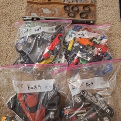 4 Bags Of Assorted 1/64th Cars