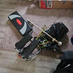 Punching Bag,2 Work Out Machines, And A Bar