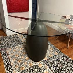 CB2 Stone base table 
