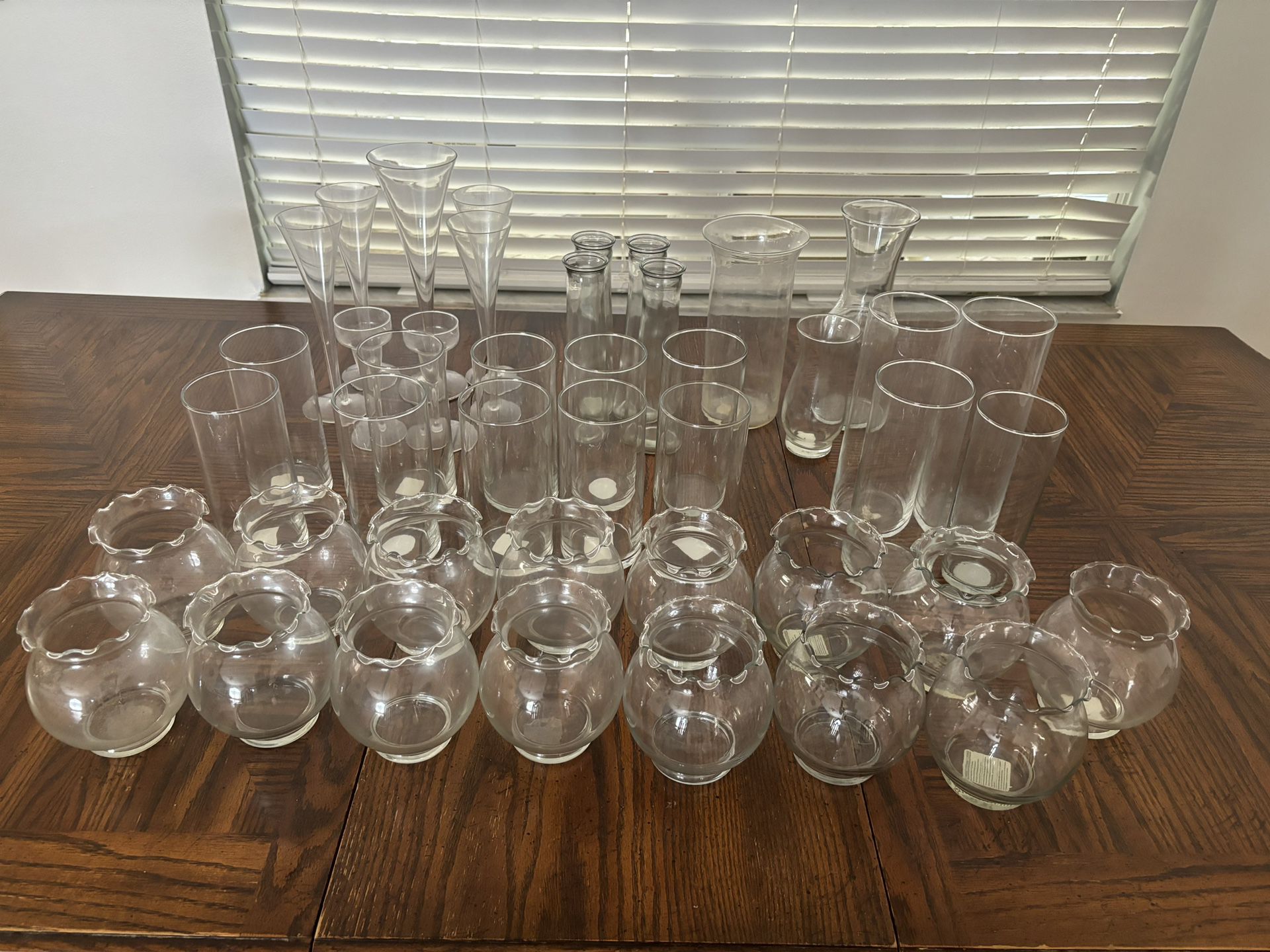 Variety of glass vases. 43 pieces.