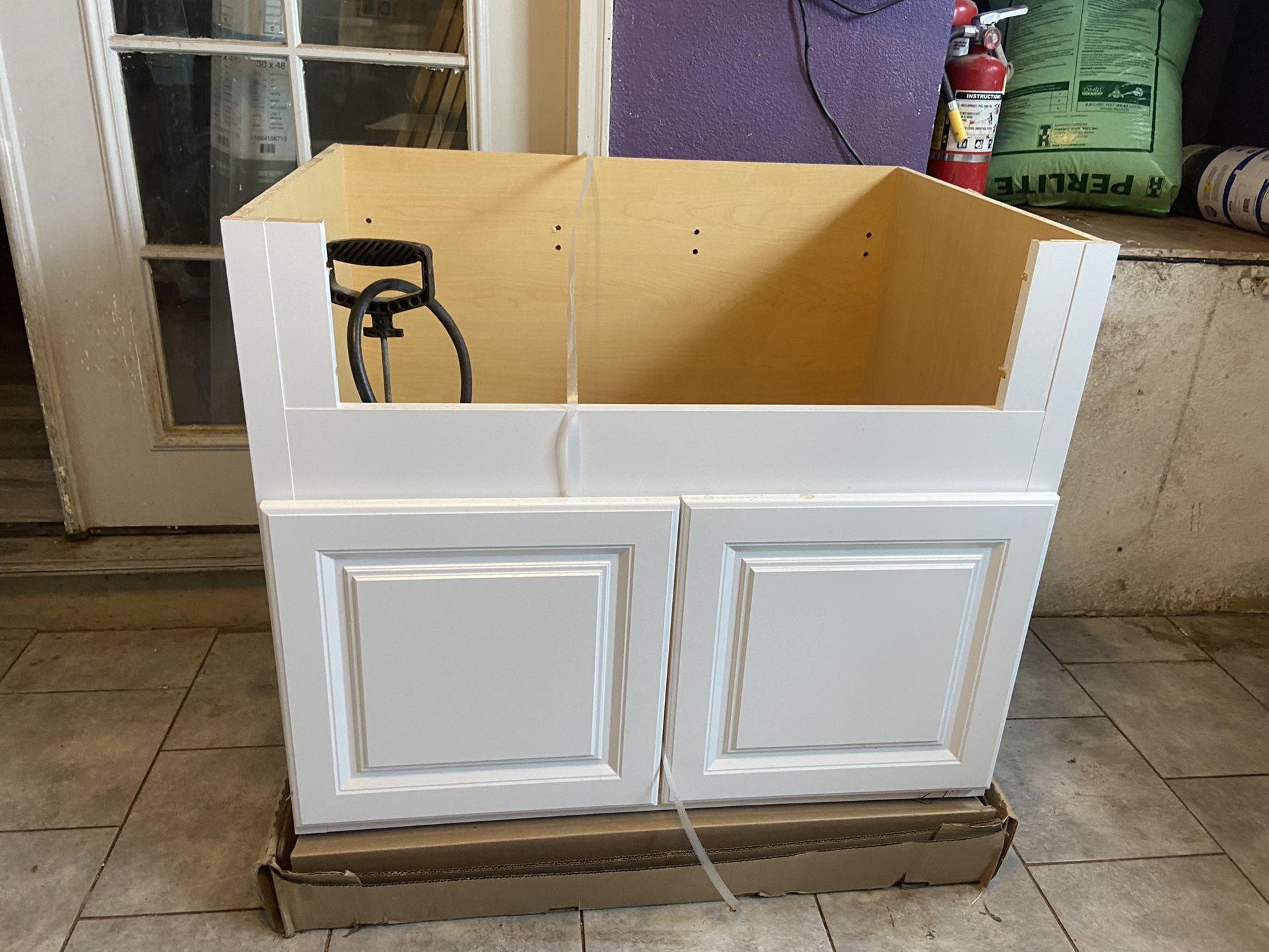 Farm sink cabinet