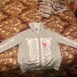 Grey and white skeleton hoodie size:XL