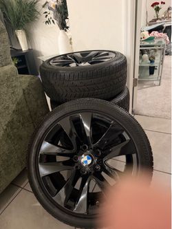 5 lung bmw rims comes with brand new tires