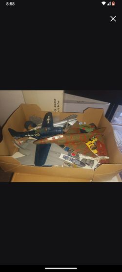 Box of loose model airplanes