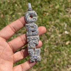 CBFW iced out chain pendant