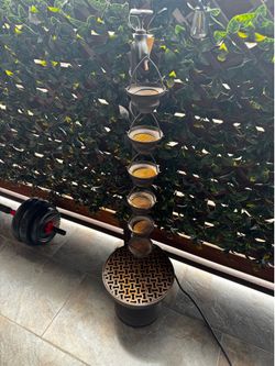 Teak table and chair and pot plants