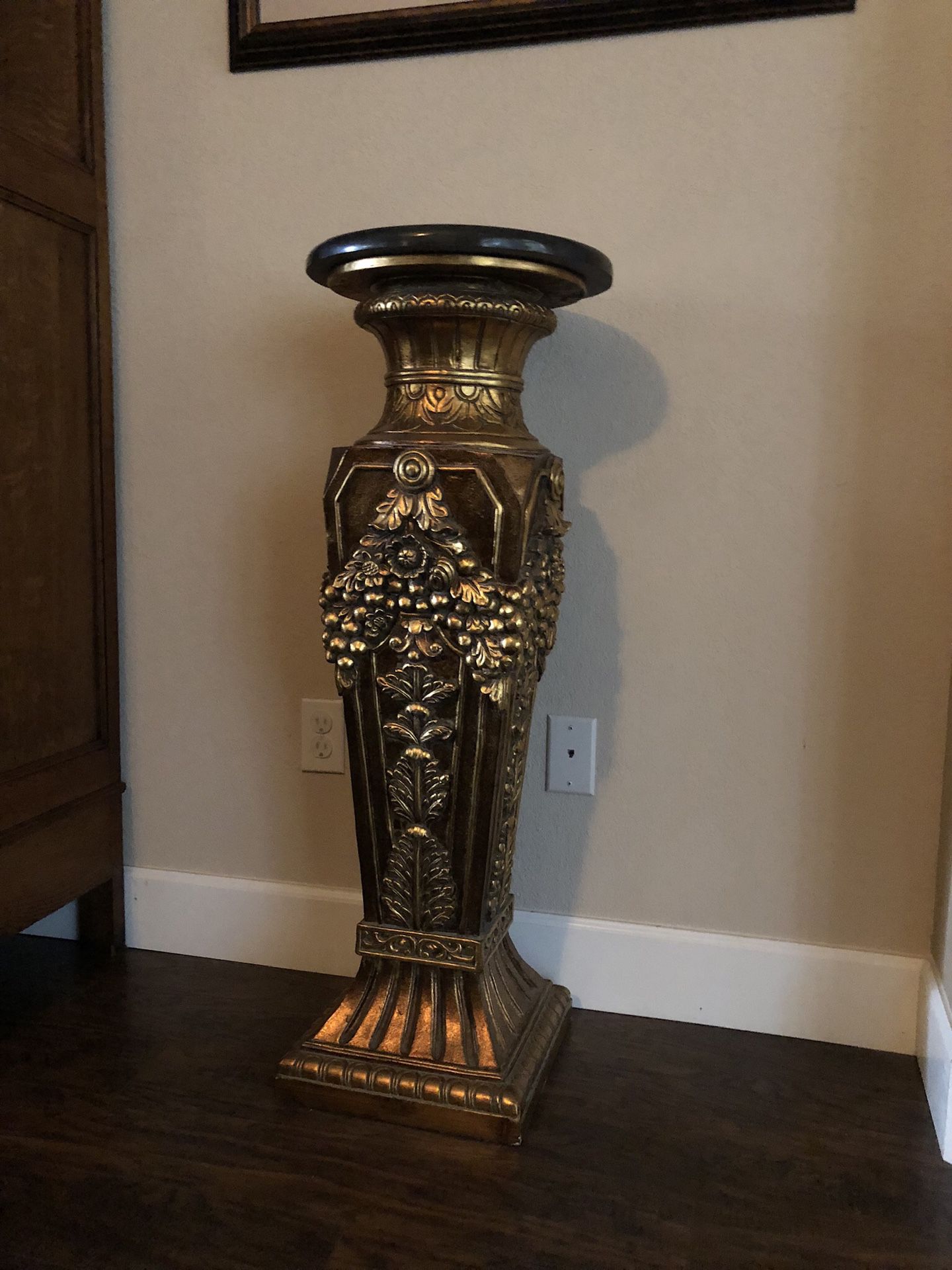 Gold with black marble top’s plant stands. Pair