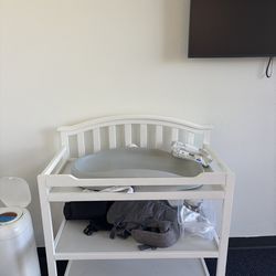 2 White diaper changing tables