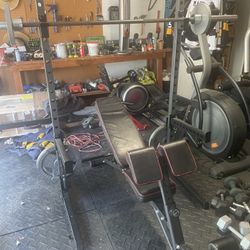 Weight Stand, Barbell, And Steel Plates