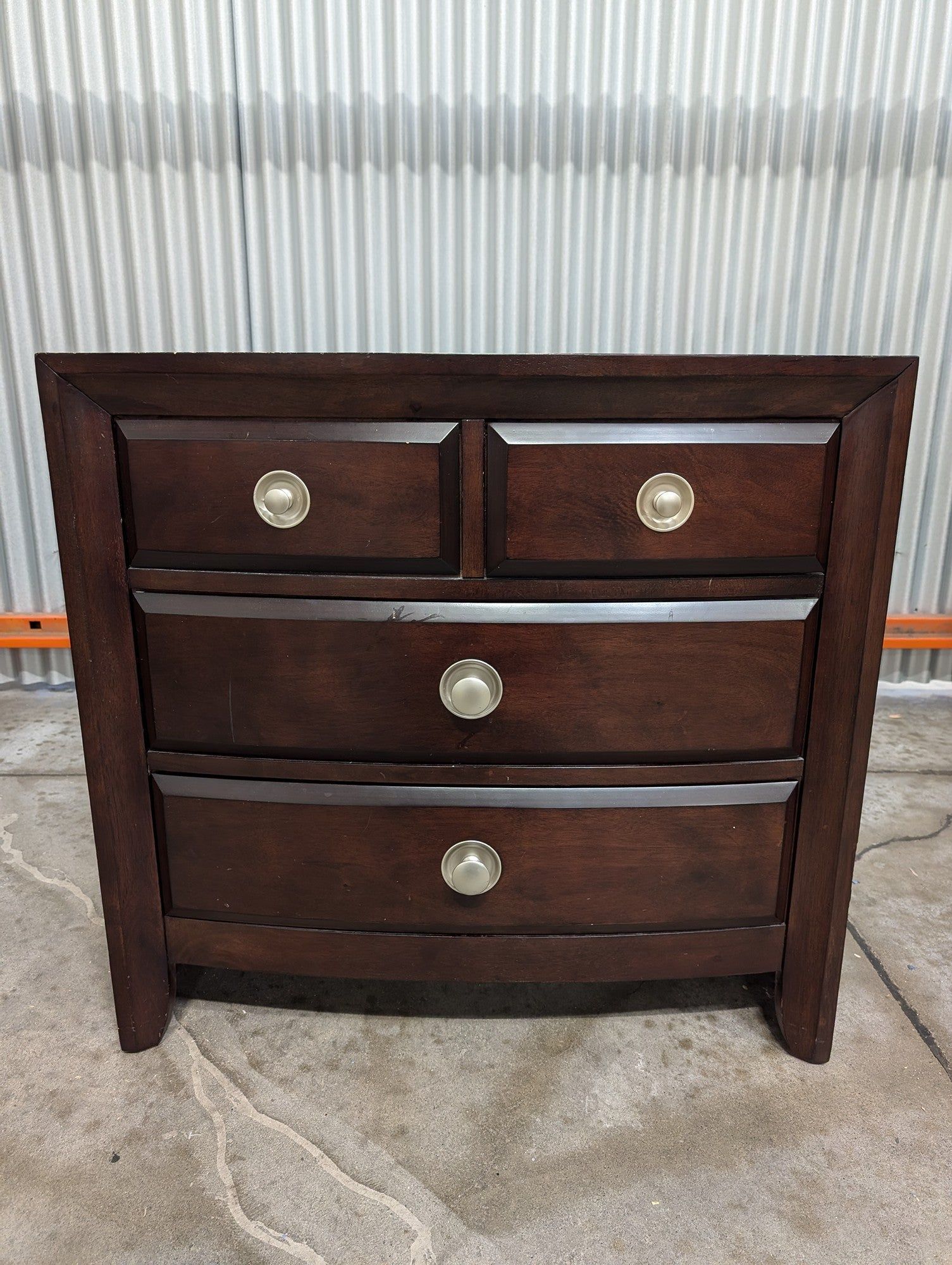 Rich Brown Wood Nightstand with Curved Drawer Fronts