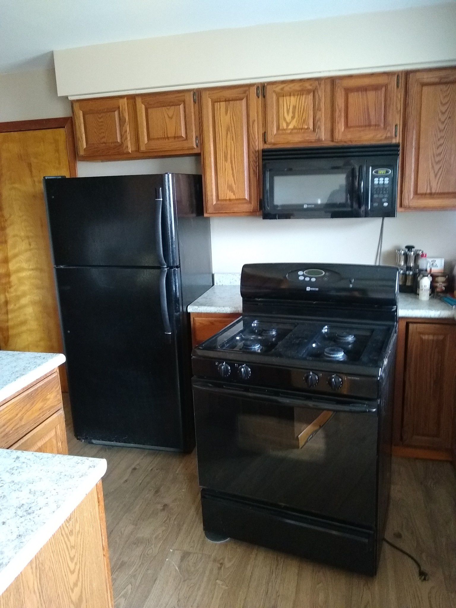 Maytag 's refrigerator , gas range and microwave