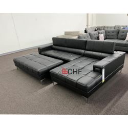 Black faux leather sectional sofa with ottoman 