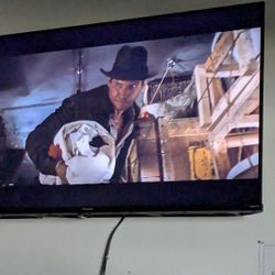 55" Samsung Television And 50" Roku Hisense Television