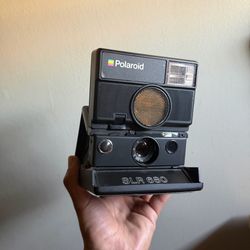 Polaroid SLR 680 Folding instant camera 600