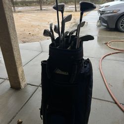 Used Titleist and Callaway golf set with Datrek bag. 