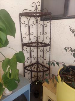 Vintage wrought iron corner shelf