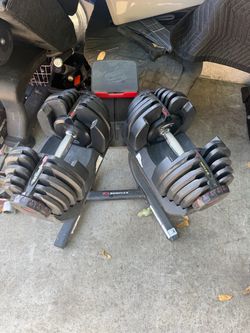Bowflex 1090 Dumbells for sale w/stand