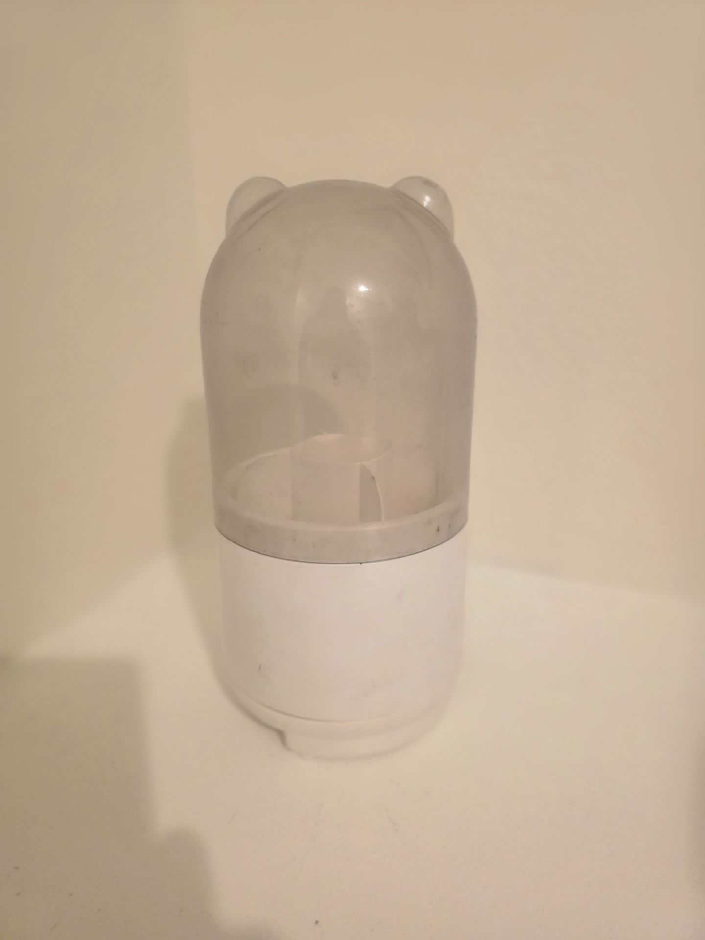 Rotating makeup brush or pencil holder with clear lid