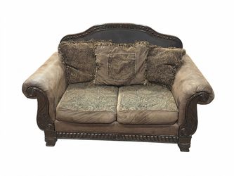 Two piece sofa and love seat  by Ashley furniture