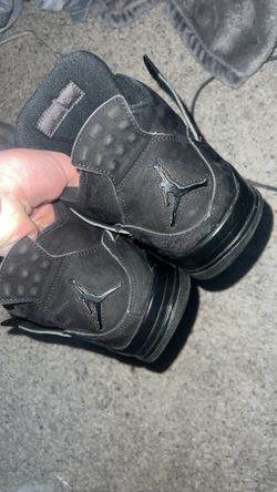Black Cat Jordan 4s