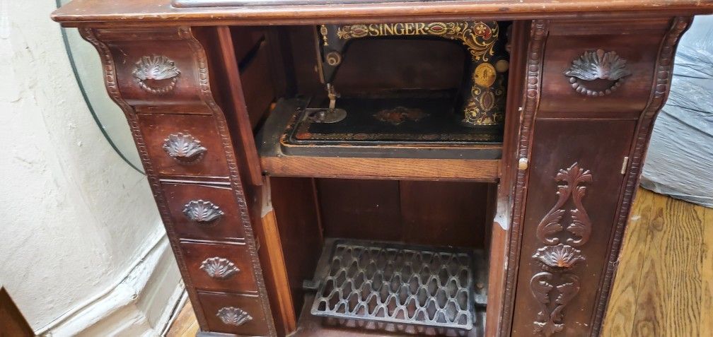 vintage singer mechanical machine.