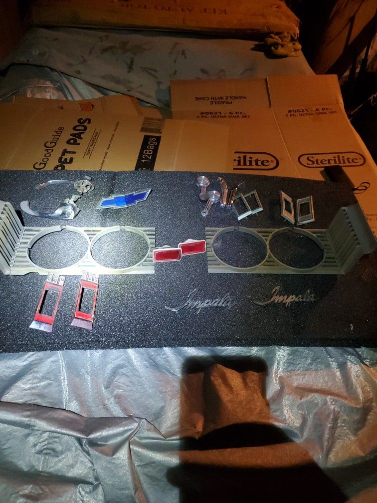 69 Impala Parts Headlight Doors Emblems Door Handles Interior And Exterior Front Grill Chevy Emblem And Fender Scripts All Original
