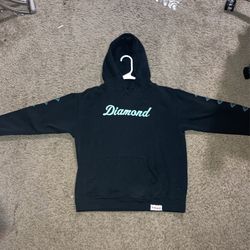All Black And Blue Diamond Hoodie With Diamonds On The Arms.