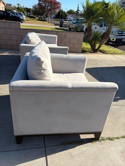 White  Upholstered Sofa with Nailhead Trim