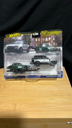 Hot Wheels Team Transport set featuring a Jaguar MK1 and a 2023 Land Rover Defender 110