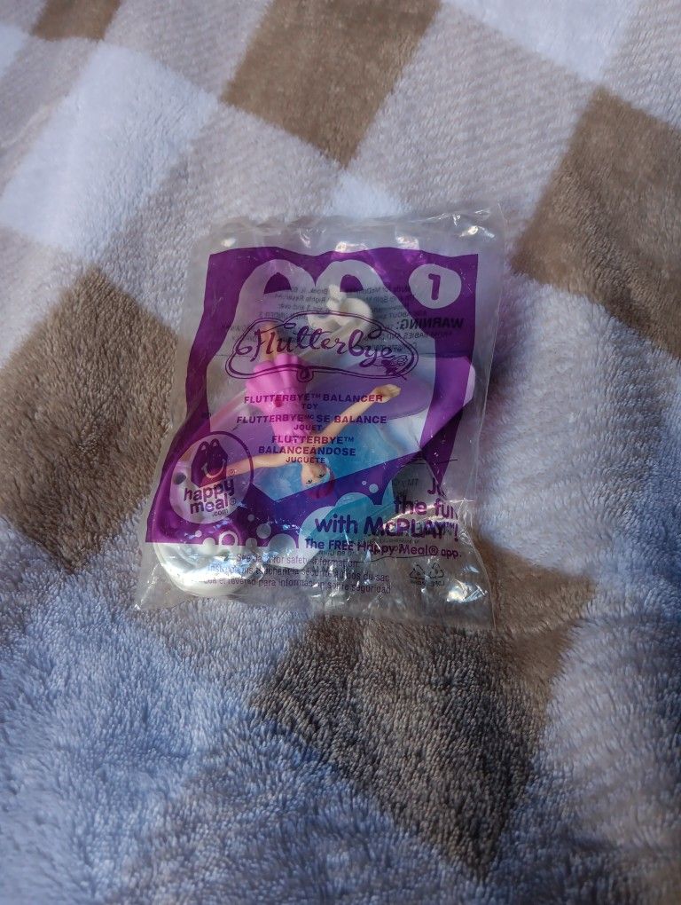 2014 McDonald's Happy Meal Toy. FLUTTERBYE Series #1.