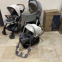 Nuna Mixx Stroller With Car Seat And Bassinet With Stand White Canopy