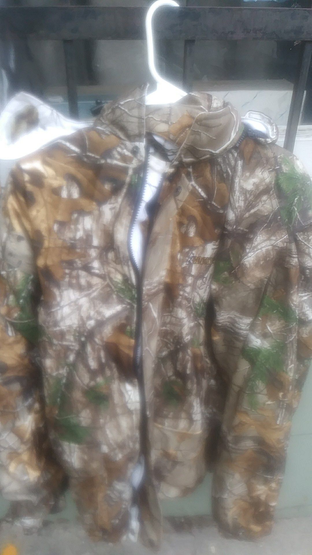 It's a rocky brand Realtree winter hunting jacket brand new and it's reversible