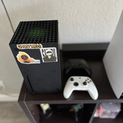 Xbox X W/ 2 Controllers.