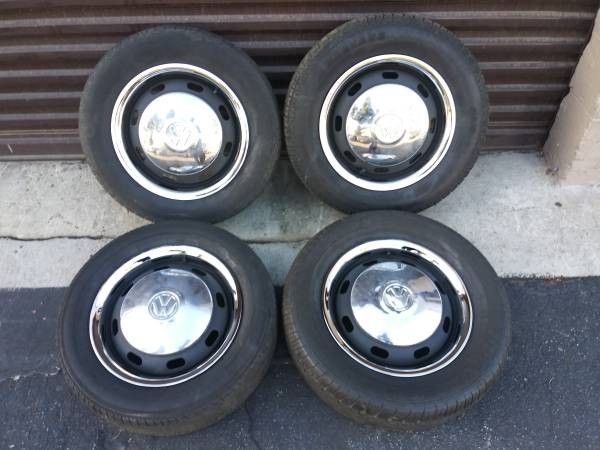 4 lug VW bug or beetle 15 inch rims with chrome caps and beauty rings ...