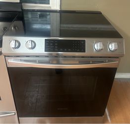 Slide in glass top stove