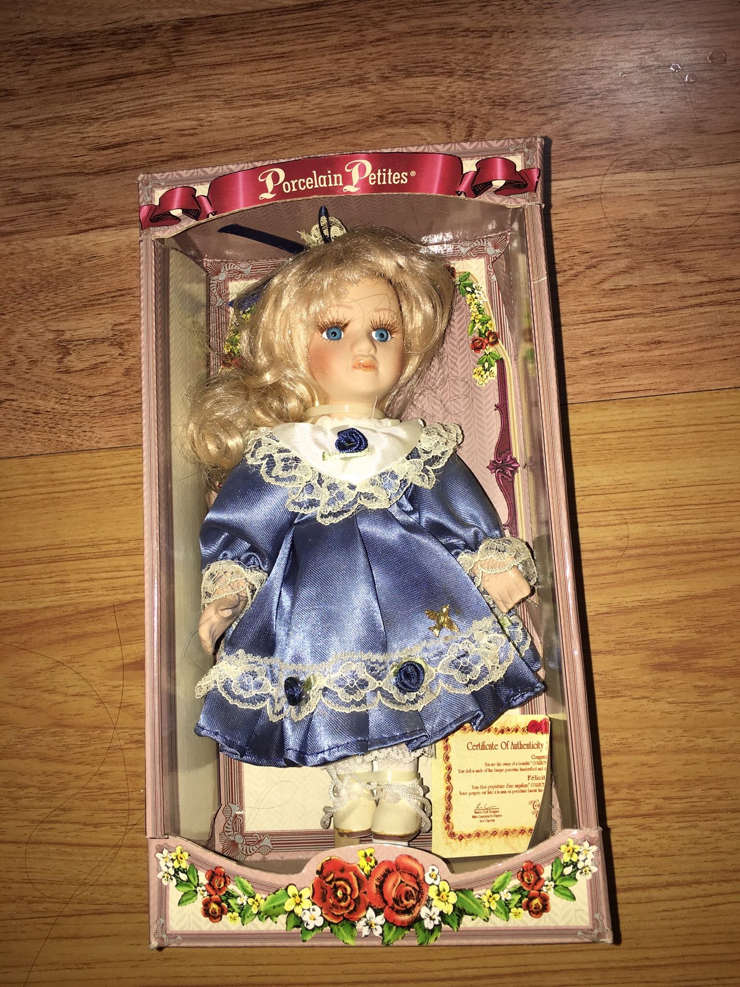 Porcelain petite doll