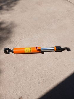 Hydraulic pullback ram