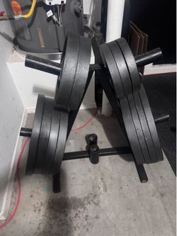 410 lbs  Cast Iron Weight Plates + Storage Rack - $550