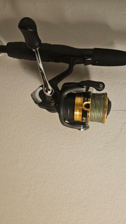 Shimano fx 2500 spinning reel with shakespear glass rod.