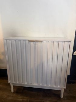 White fluted 2 door cabinet