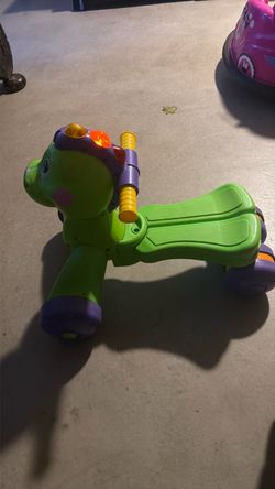 Fisher price Dino stand and ride