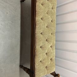 Vintage upholstered wooden bench or vanity bench.