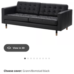 Black leather couch with automan