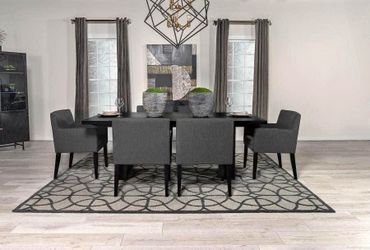  Modern Dining table features oak veneer with a black top